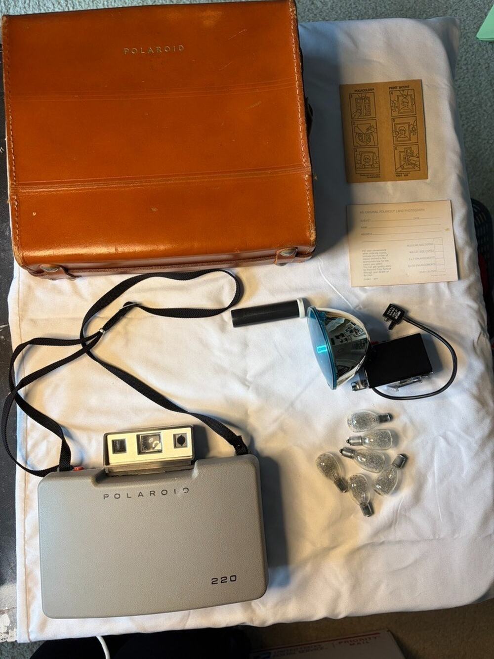 Polaroid Automatic 220 Land Camera, Leather Case, Bulbs and Flash